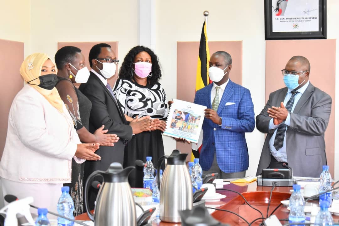 The Chairperson UHRC Mariam Wangadya (3rd R) presenting the 24th Annual Report on the state of Rights and freedoms in Uganda in 2021 to the Deputy Speaker of Parliament Rt. Hon. Thomas Tayebwa (2nd R) at Parliament of Uganda on June 13th 2022. Also in the picture are members of the commission, Hon. Shifrah Lukwago (Extreme Left), Hon. Jacklet Atuhaire Rwabukurukuru (2nd Left) and Hon. Crispin Kaheru (next to the Chairperson)